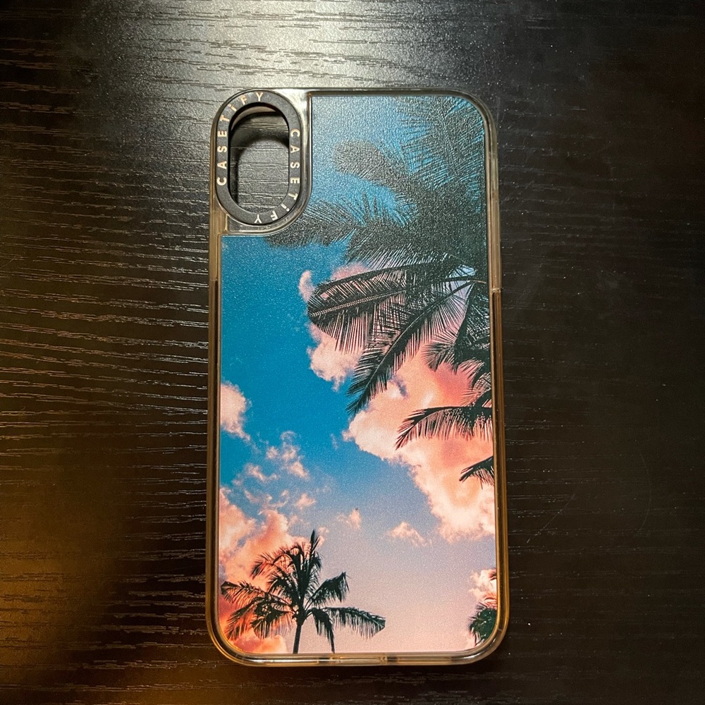 Casetify IPhone case, sunset with palm trees.